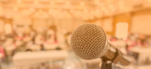 Magali-Barcelo-conference-mic